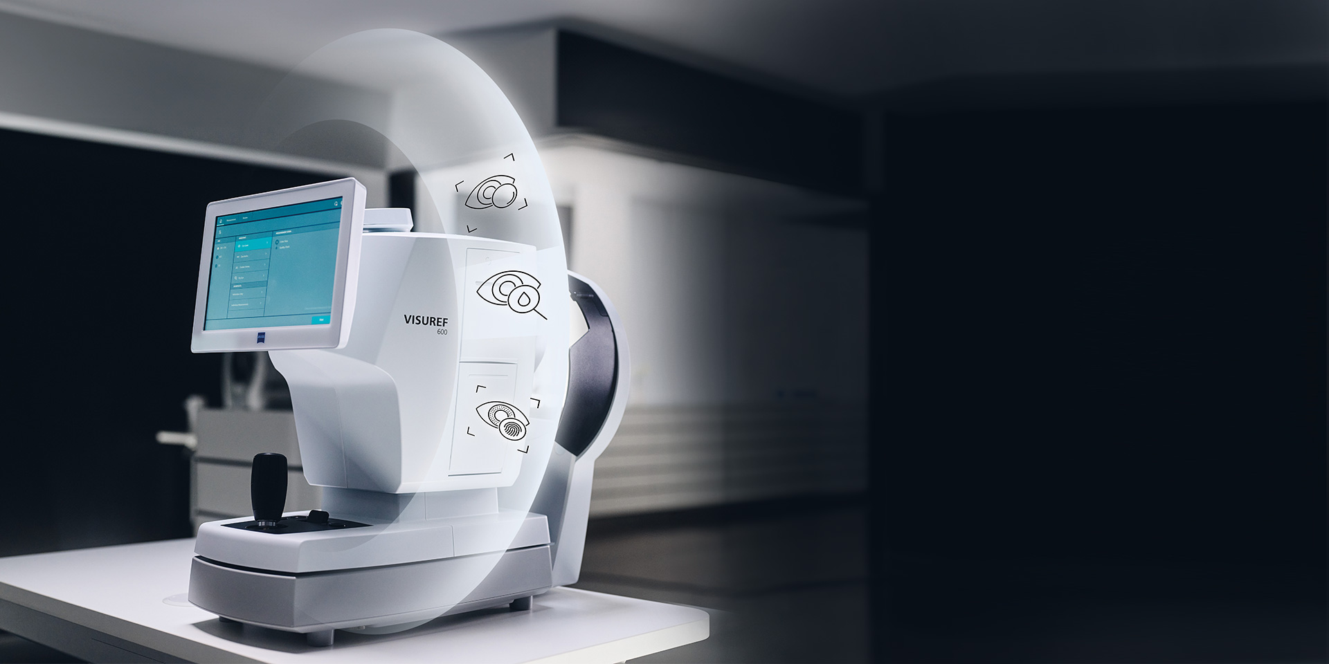 Kuva, jossa on pöydällä oleva ZEISS VISUREF 600 sekä piirros puoliksi läpinäkyvästä kehästä, jonka ympärillä on symboleja.
