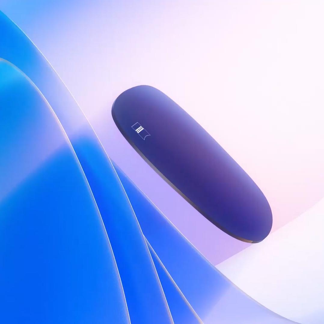 3D CGI -havainnekuva sävytetystä linssistä, joka leijuu kohti valonlähdettä estäen tehokkaasti haitalliset UV-säteet.