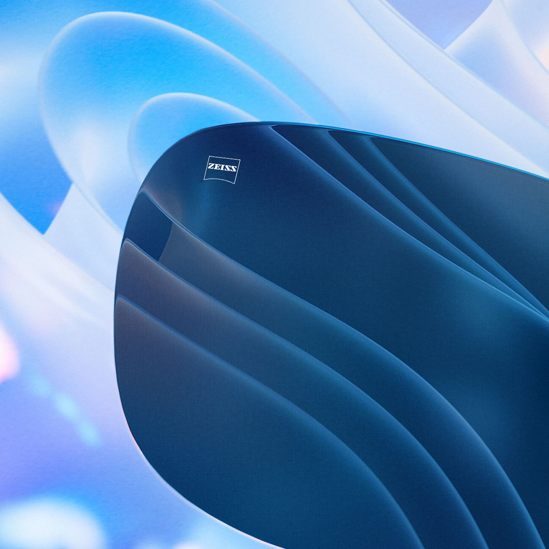 CGI-havainnekuva sävytetystä linssistä, joka estää tehokkaasti taustalla näkyvän häikäisyn